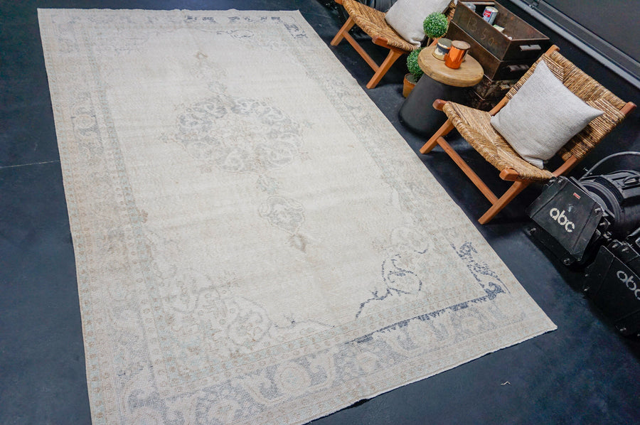 6’10 x 10’5 Vintage Oushak Rug Muted Beige, Blues + Sea Blue