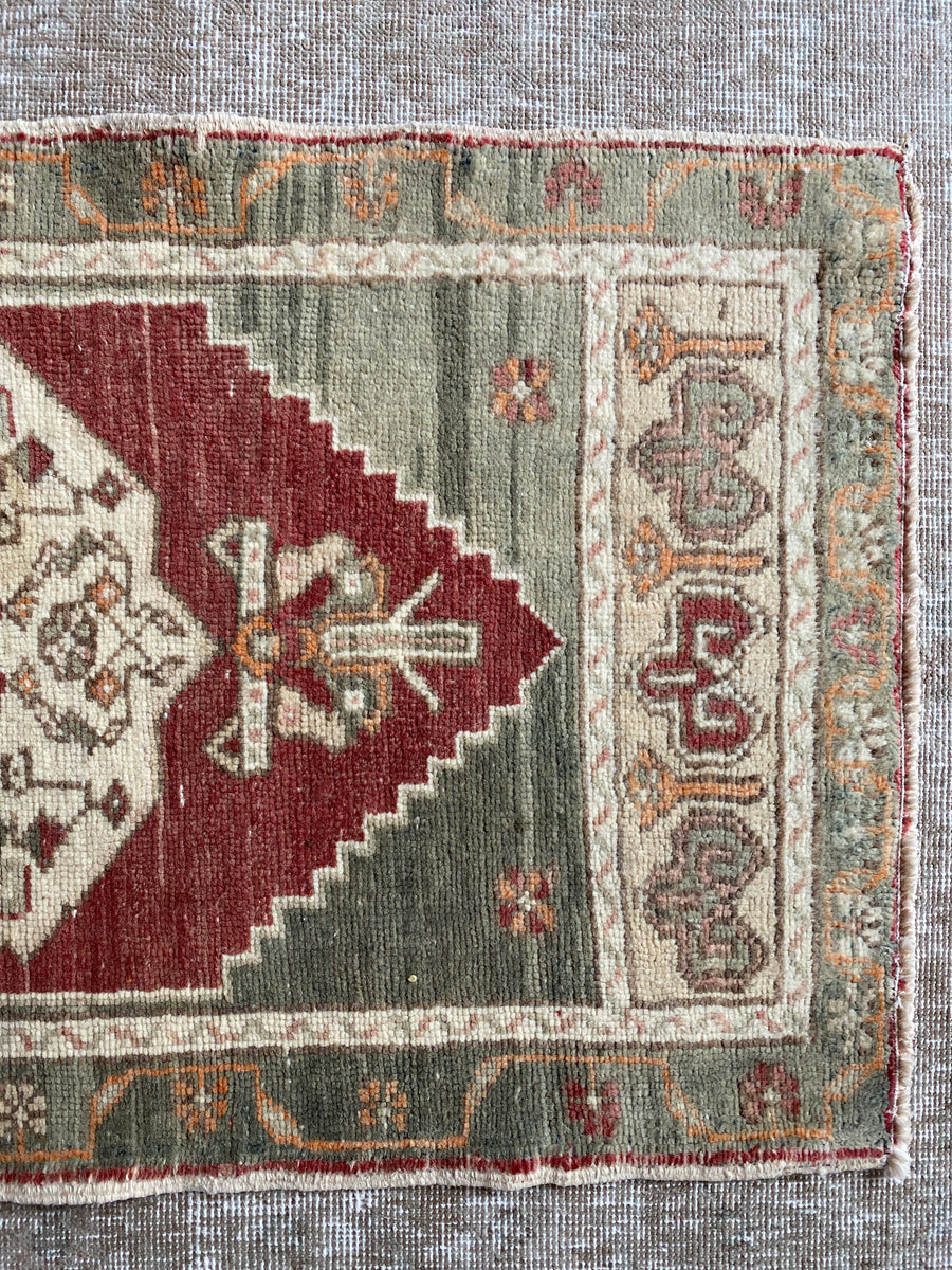 1’10” x 3’9” Vintage Turkish Oushak Mat Rug Muted Brick, Pale yellow + Green